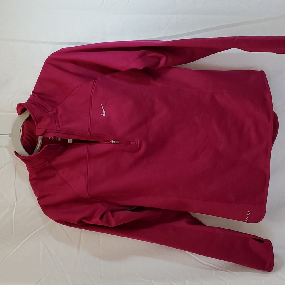 Nike running medium size top. Is light Winter weight
